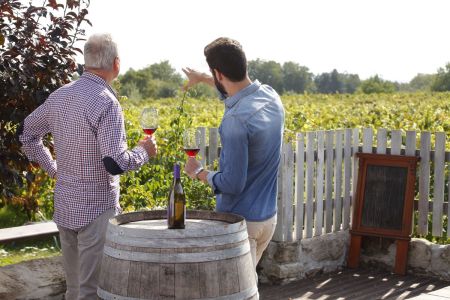 Enjoying a bottle overlooking the vineyards.